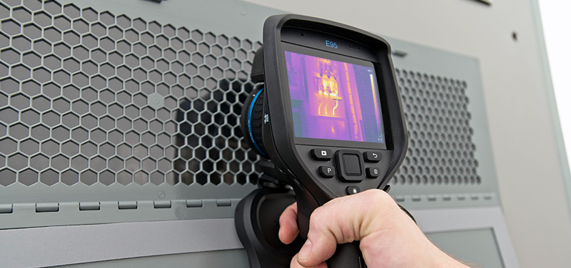 Thermography being performed through an IR Window